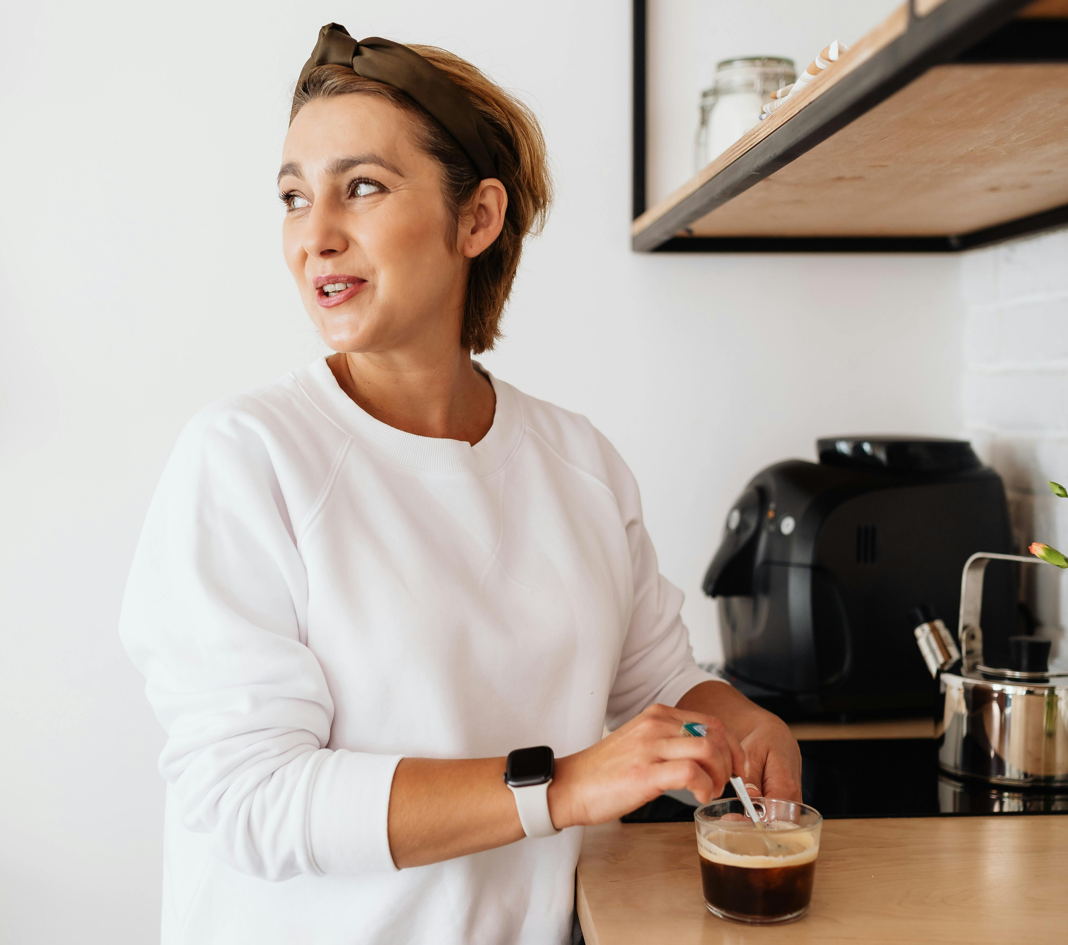 Woman in kitchen making a mindful choice
